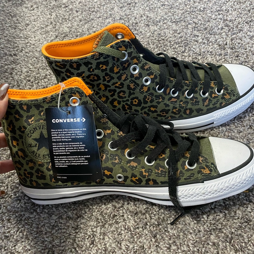 Cheetah converse high tops. Size 8 men , 10 women brand new with tags